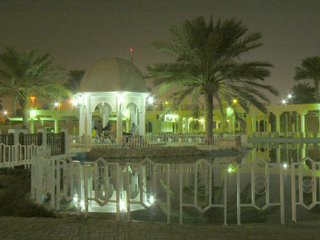 Lights reflect of the water in a Doha park