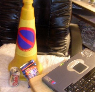 wotsits and coke. What more does a yellow cone need?