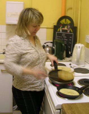 Collette tosses those pancakes... home made? yeah right!