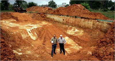 Stonewall, MS developers excavate a segregation-era swimming pool amid piles of red dust