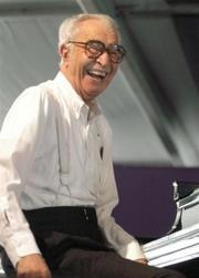Jazz great pianist Dave Brubeck performs at the New Orleans Jazz & Heritage Festival, in this May 1, 2004, (AP file photo.)