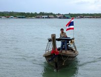 Longtail Boat approaching Laem Hin