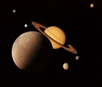 This montage of images of the Saturnian system was prepared from an assemblage of images taken by the Voyager 1 spacecraft.