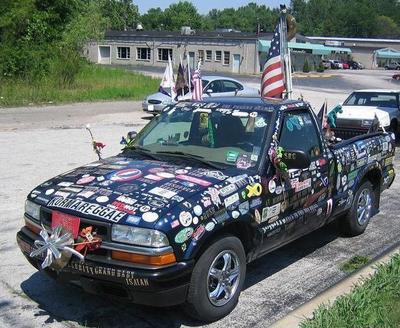 Pickup truck covered with bumper stickers