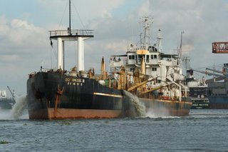 Ship discharging near Fort Kochi