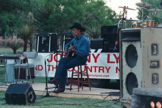 Cowboy singer at Texas barbecue, Cibolo Ranch, Texas, May, 2002
