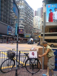 old man with washington apple box on his bike, hong kong. click for big version