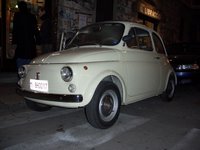 Our Fiat 500F, newly purchased, street parked in Milan's Navigli district