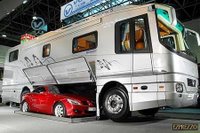 RV with parking space for a car.