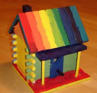 Rainbow coloured bird house front