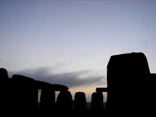 Stonehenge at sunrise on the shortest day of the year.  Salisbury Plain Britain