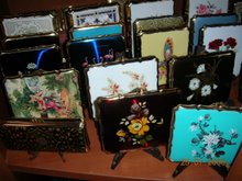An Intresting Collection of Ashtrays Compacts & Cases.