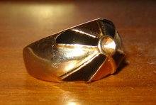 Svart/'guld' ring