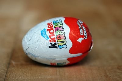 photograph picture how to wrap and eat a kinder egg surprise