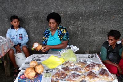 photograph picture of suva market fresh coconut stall