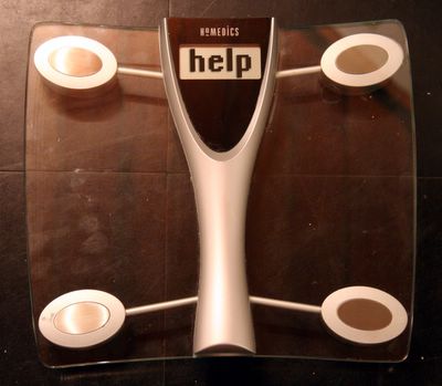 photograph picture of a pair of bathroom scales 