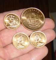 gold coins at hand