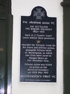 This is the Memorial Plaque at Whitehaven, Cumbria outside the birthplace of Abe Acton VC. In WW1 Abe Acton and another of the West Cumbrian 'pals', Jimmy Smith from the neoghbouring town of Workington were awarded the Victoria Cross for the gallantry at Rouges Bancs, France on 21 December 1914.