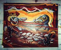 A trout painting on a recyled , framed painting, in the West Bank School of Art, by Eric Keast.
