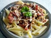 photograph picture of vegan main meal entree Penne with Tomatoes, Aubergine and Vegi Cheese recipes for IMBB#19