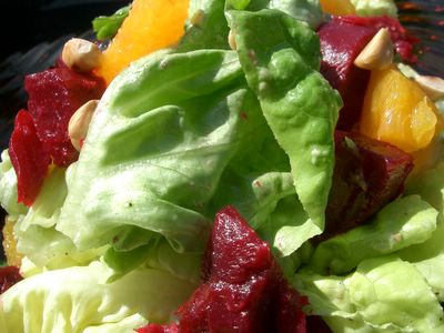 photograph of butter lettuce beet, organge and hazelnut salad with avocado dressing from Tabla in Larkspur, Marin COunty California