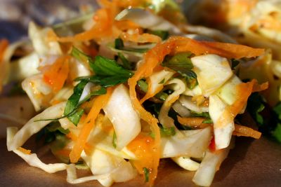 photograph picture of spicy chili coleslaw with cilantro and lime