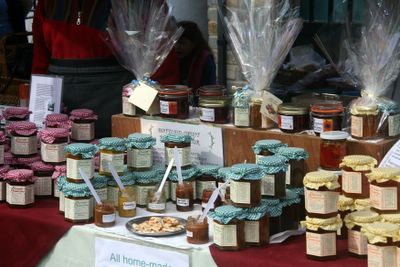 photograph picture of preserves stall at Cheddar Farmers Market, England