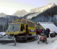 Early Morning Snowcat loading guests at Chatter Creek