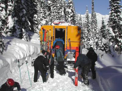 A Bombardier Snowcat with it's Metal Form cab loading Chatter Creek Snowcat Skiers 