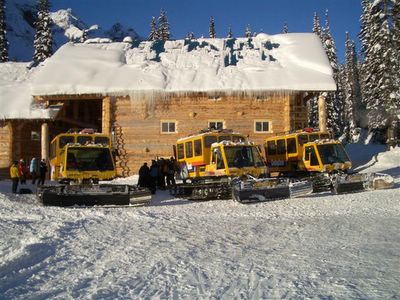 Camoplast / Bombardier Snowcats beside Vertebrae Lodge at Chatter Creek Snowcat Skiing