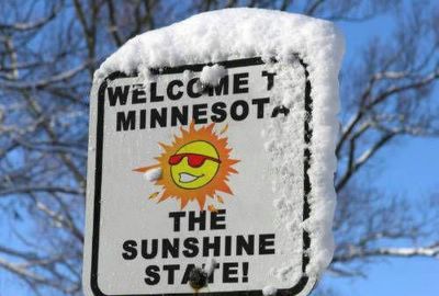 A sign that reads: Welcome to Minnesota - The Sunshine State