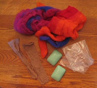Supplies needed to make felted soaps.