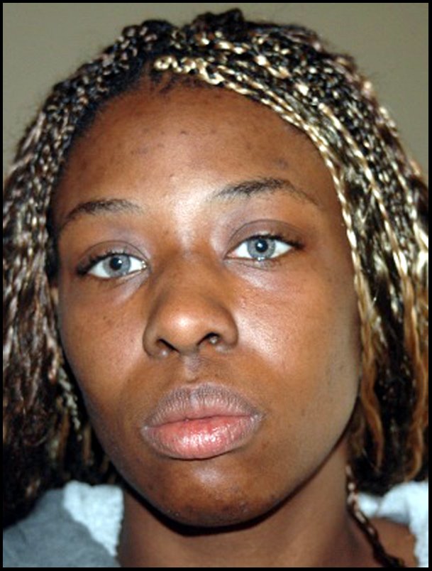 Crystal Gail Mangum - police photo Mar. 16, 2006 - enlarged/enhanced