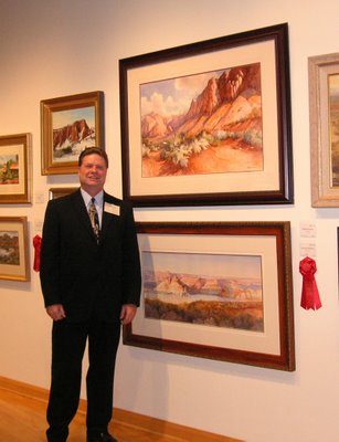 Roland Lee with award winnning painting at Sears Invitational Art Show