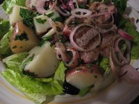 lamb chop grilled salad boiled potatoes red onion black olive lettuce vinaigrette
