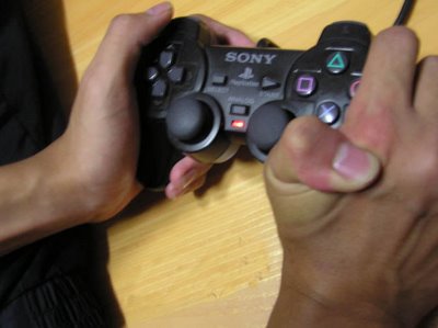playstation 2 player bending finger backward