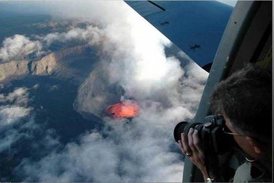taking a photograph of volcano from above