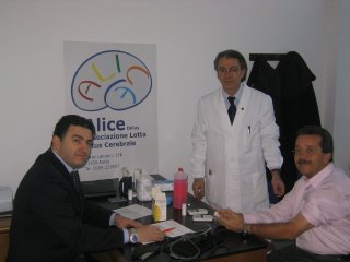 il dottor Marco Bacchieri Cortesi, il dottor Giuseppe D'Alessandro e il sindaco di Aosta Guido Grimod