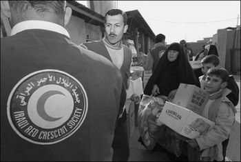 Red Crescent distributing food Iraq December 23 2006