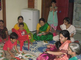 Section of ladies with kids during Bhajane