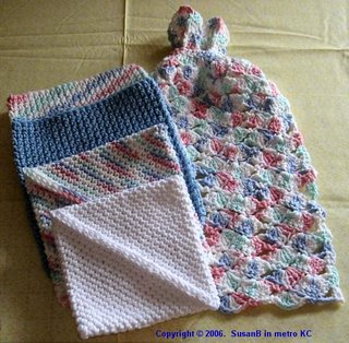 crocheted potholders and kitchen towel