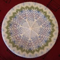 Top of Snowflakes Tam blocking on a dinner plate