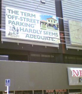 Billboard advertising the Hutt Valley - The term 'off-street parking' hardly seems adequate