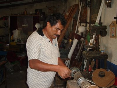 Mark in Mexico, http://markinmexico.blogspot.com/ Pale Horse Galleries for gifts, collectibles, Mexican arts and crafts, http://palehorsemex.vstore.com/ palehorsemex.blogspot.com/ Angel Aguilar pictured polishing a hand forged and tempered knife blade in Ocotlan, Oaxaca, Mexico.