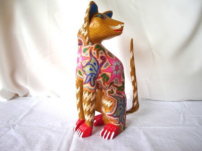 For gifts, collectibles, arts and Mexican crafts, visit Pale Horse Galleries, http://palehorsemex.vstore.ca/, Gato Dorado Sentantodose -- Golden Cat Seated by Felipe and Lucila Zarate.