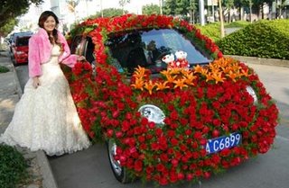 Flower Covered wedding Car