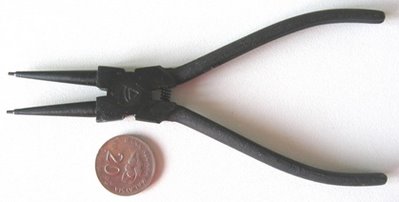 A Black Metal Round Nose Pliers