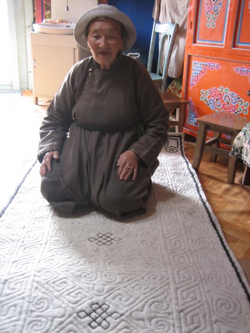 Naran's Grandma and the rug she made