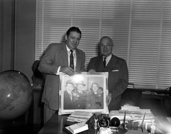 Former President Harry S Truman receives Family Portrait