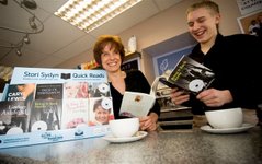 Sian and David enjoy the books at the Chambers Cafe